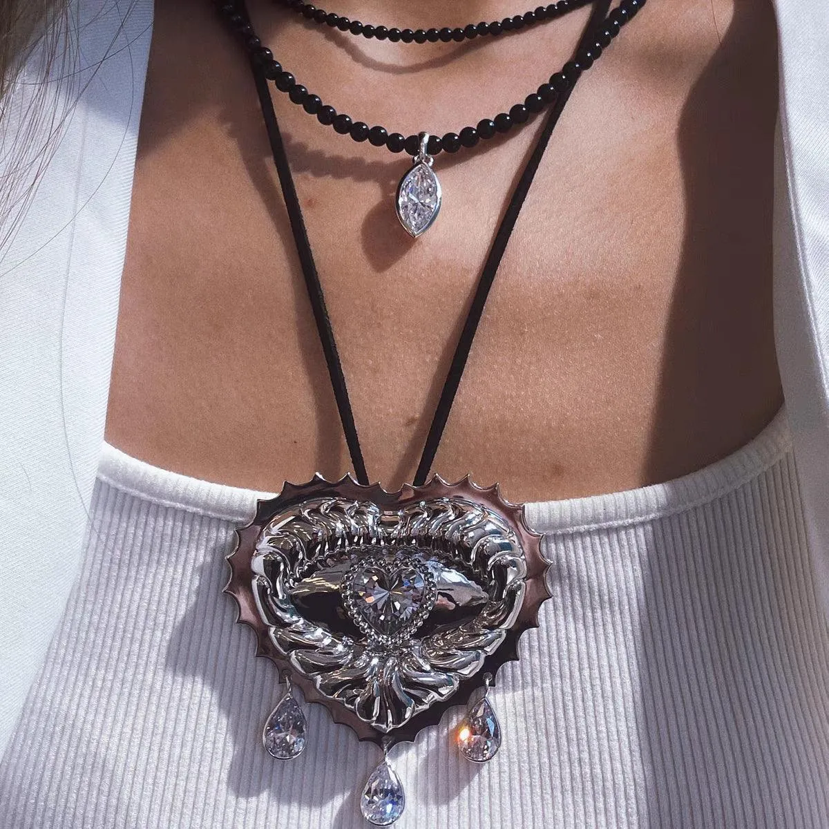 Heart Crystal Eye Sun Embossed Brooches Or pendants Two Usages